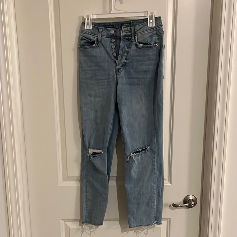 Women's Distressed Blue Jeans